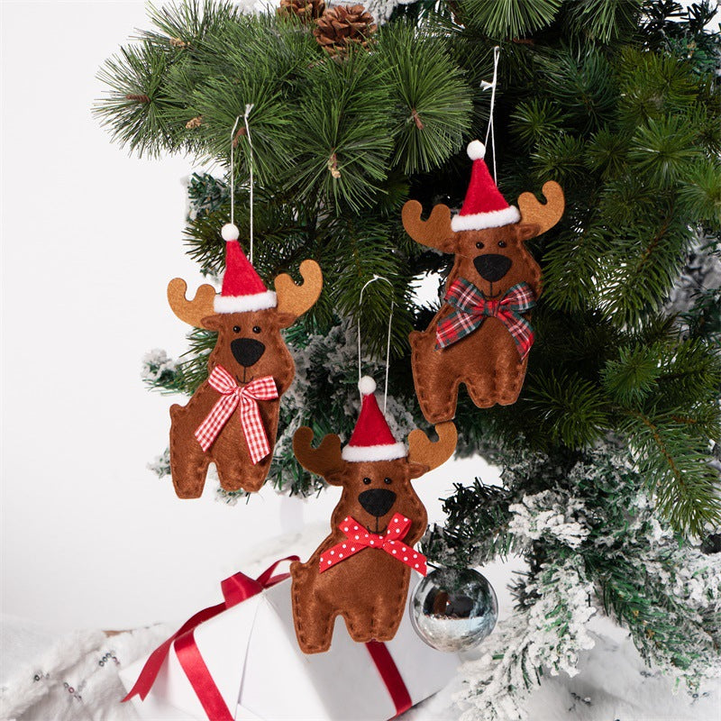 Three fabric reindeer pendants showcasing Christmas ornament craftsmanship