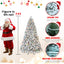 Flocked PVC Christmas tree with colorful lights in a cozy living room setting