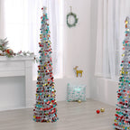 Compact folded Christmas tree illustration showing space-saving design