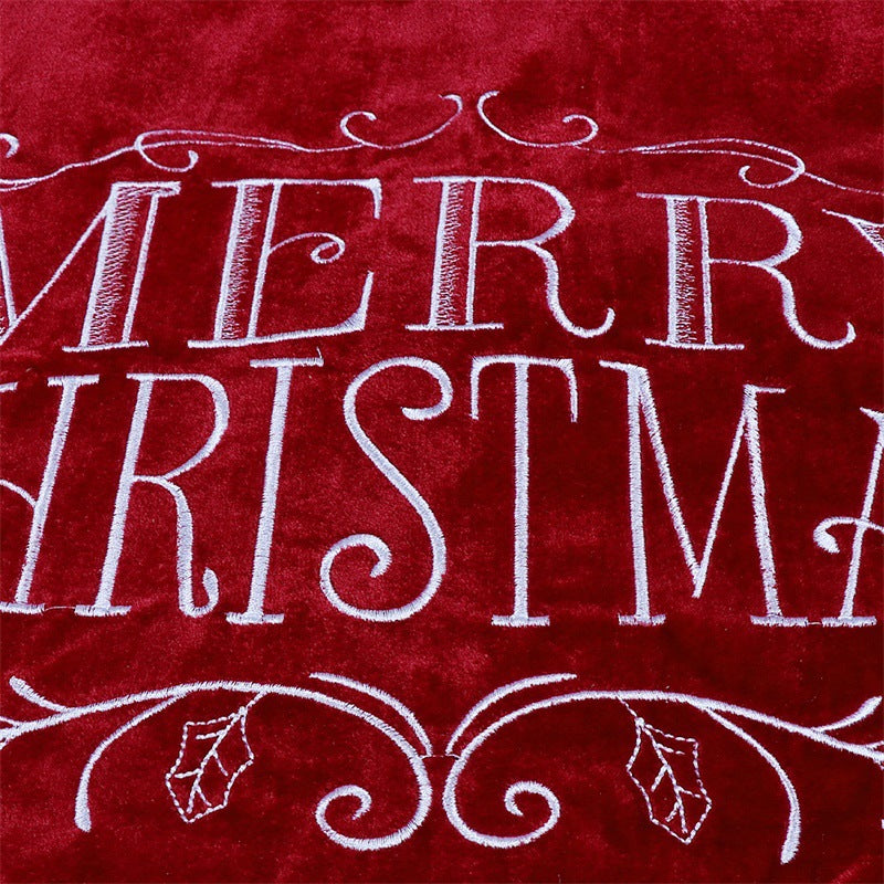 Festive red velvet tree skirt ready to decorate your Christian home