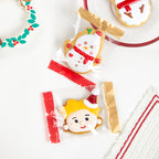 Close-up of red Christmas packaging bags, cheerful holiday gift wrapping accessories