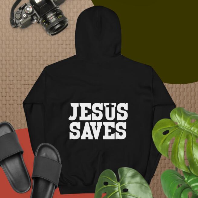 Close-up of Jesus Saves text printed on black hoodie fabric