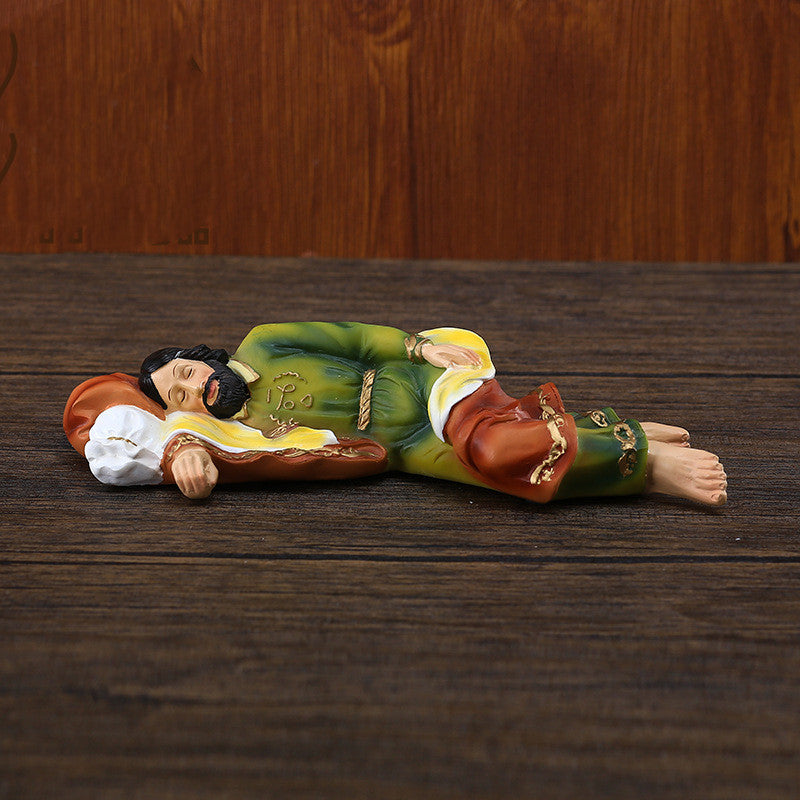 Saint Joseph ornament displayed as wall hanging in home setting