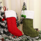 Set of three knitted Christmas sock ornaments in white red green variants