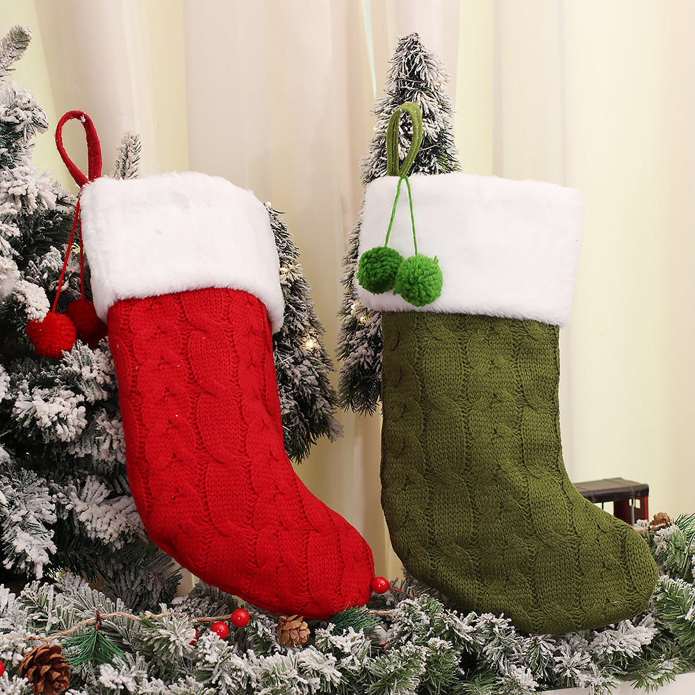 Set of three knitted Christmas sock ornaments in white red green variants