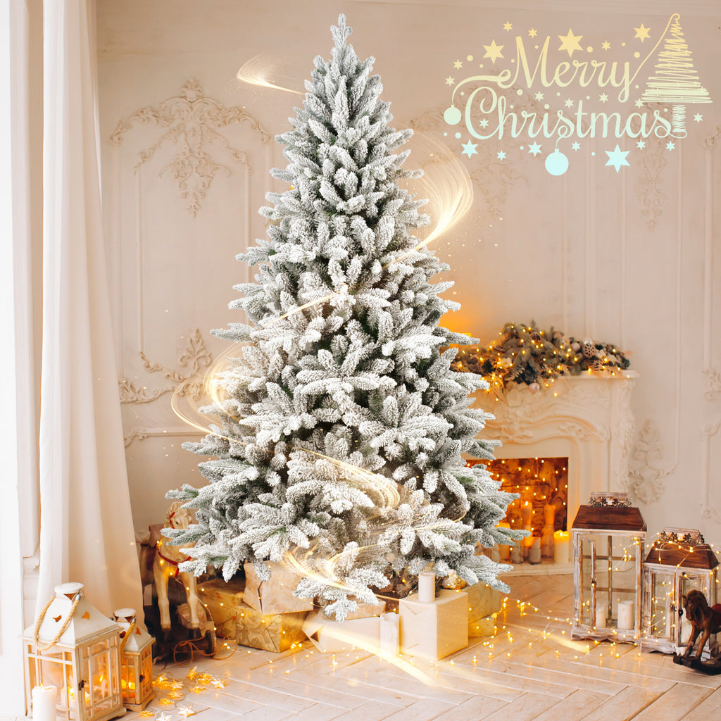 Elegant holiday centerpiece featuring decorated tree with ornaments and ribbons