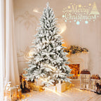 Elegant holiday centerpiece featuring decorated tree with ornaments and ribbons