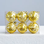 Assorted colored Christmas ornament balls including gold and blue for seasonal decorating