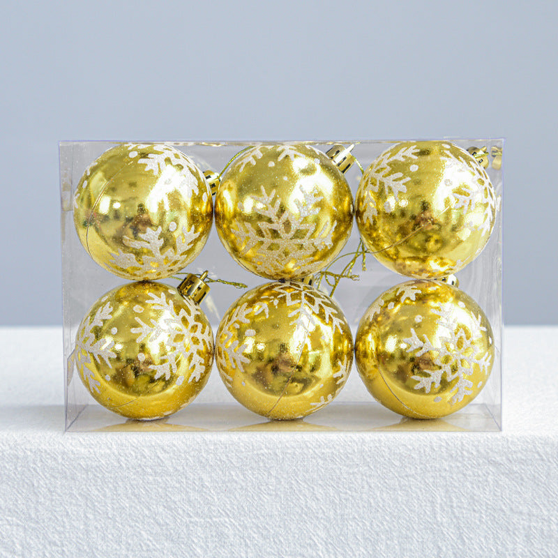 Assorted colored Christmas ornament balls including gold and blue for seasonal decorating