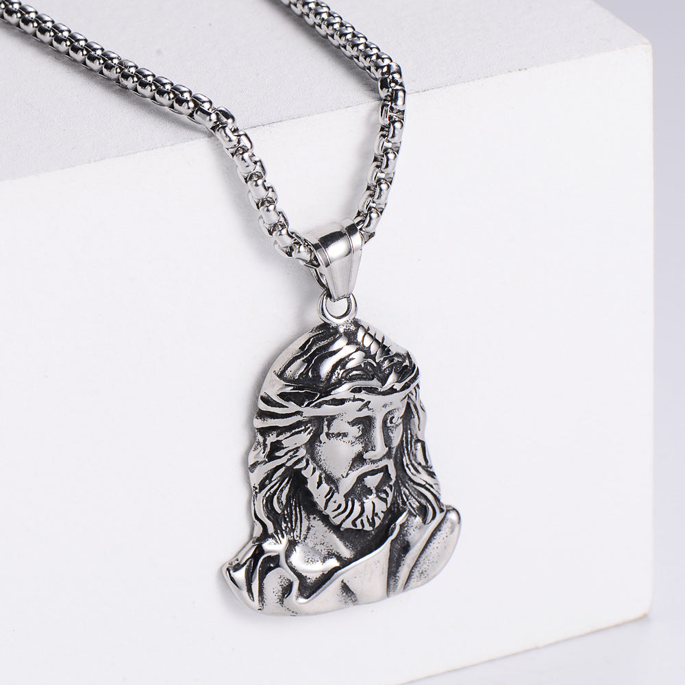 Close-up of religious Jesus pendant in stainless steel