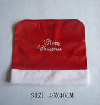 Christmas red cloth chair cover with festive table setting and holiday ambiance
