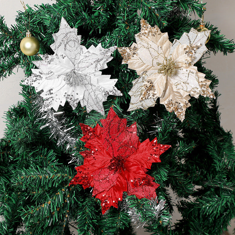Close-up of sparkling glitter Christmas flower petals showing detail and festive craftsmanship