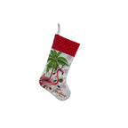 Christmas stocking featuring flamingo and holiday elements
