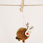 Elk and Christmas tree cloth pendant in warm holiday tones