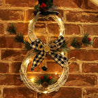Christmas wreath pendant with battery powered LED lights for holiday display