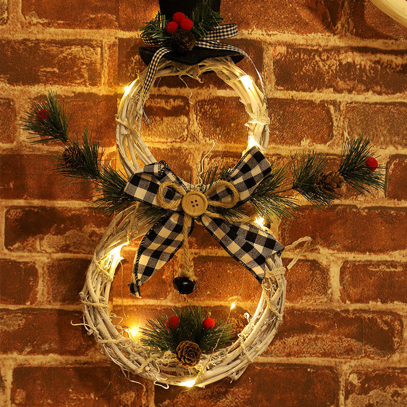 Christmas wreath pendant with battery powered LED lights for holiday display