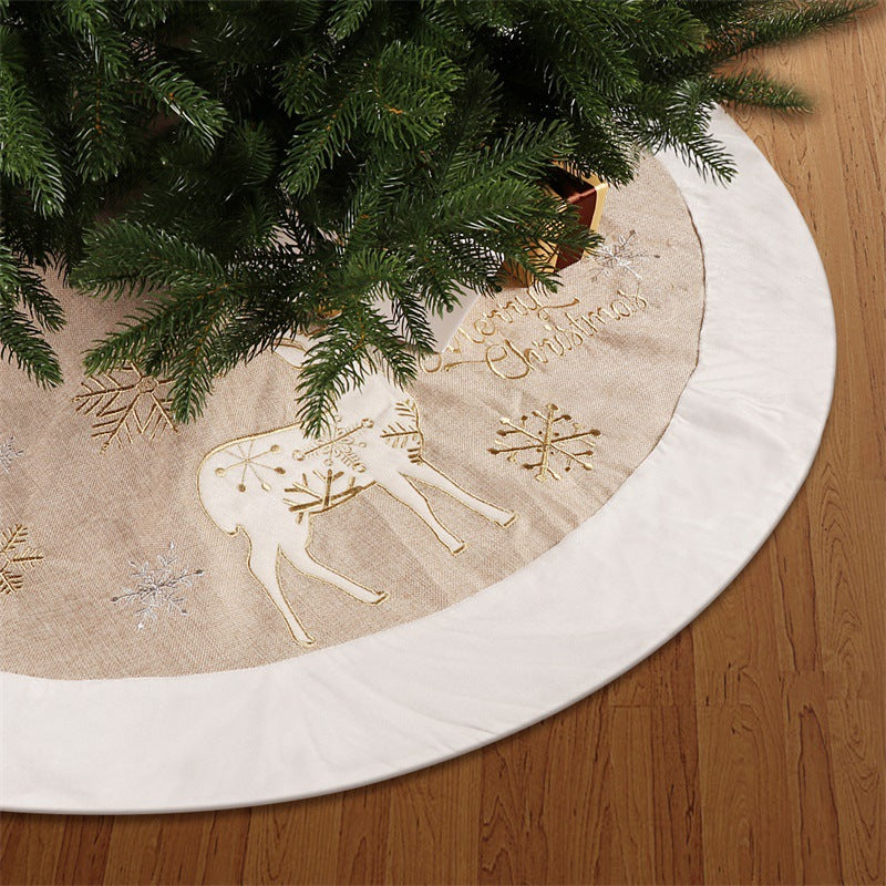 Close-up of elegant gold and white linen fabric texture for Christmas tree skirt