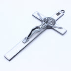 Zinc alloy crucifix ornament displayed on wall
