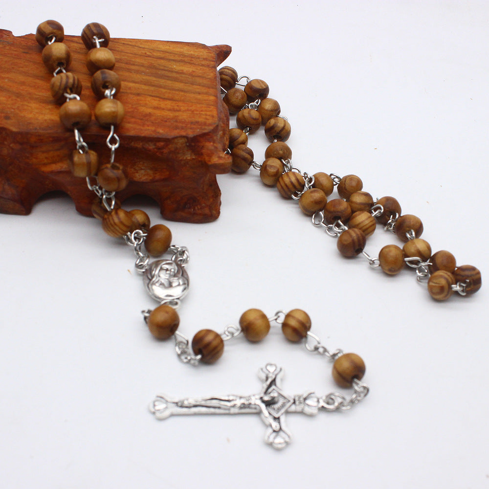 Catholic wooden rosary necklace with red beads and cross pendant for prayer and devotion Main image