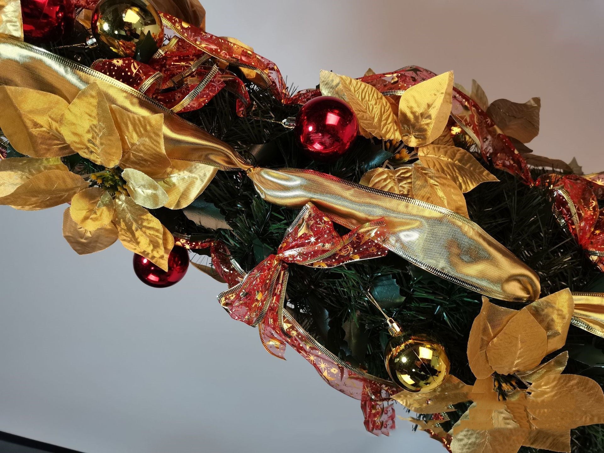 Modern spiral Christmas tree in bright colors for holiday gatherings