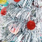 Folding Christmas tree with ornaments ready for Christmas celebration