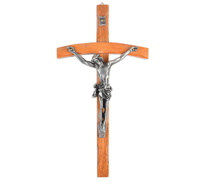 Close-up of solid wood and zinc alloy cross featuring Christ figure