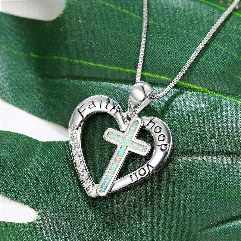 Imitation opal cross pendant necklace with box chain detail