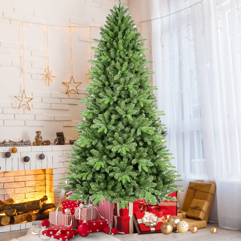 6ft PE/PVC mixed Christmas tree with 1168 tips standing in a festive living room
