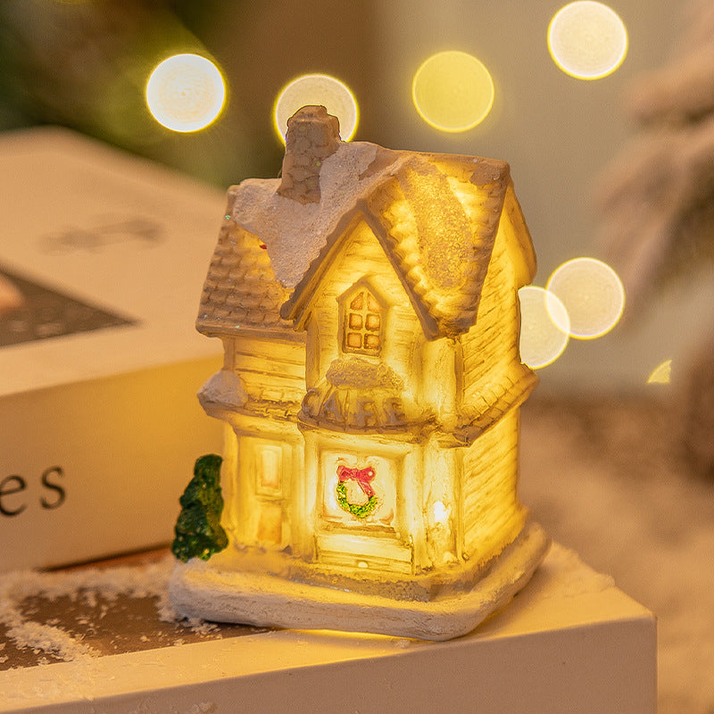 White resin miniature house Christmas decoration with clean classic lines