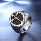 Men's gold-tone cross ring showing the iconic Christian cross design