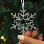 Silver snowflake necklace close-up detail view