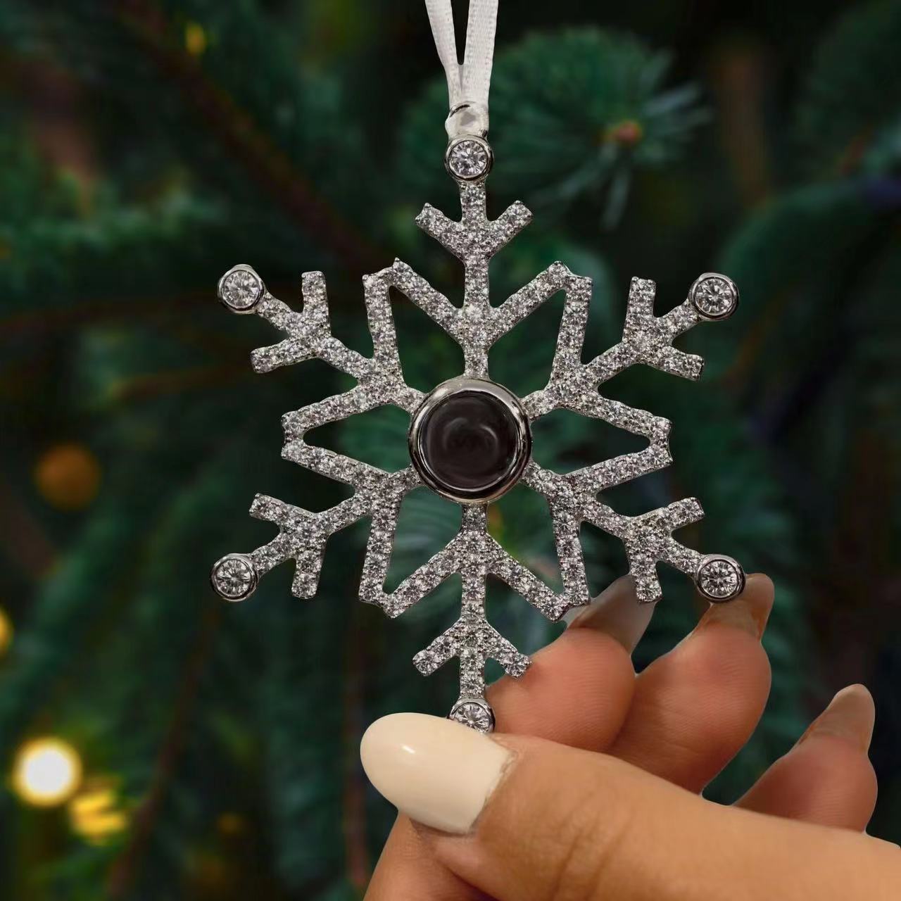 Silver snowflake necklace close-up detail view