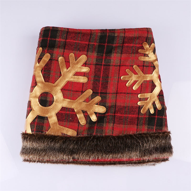 Festive Christmas tree skirt ready to frame a decorated holiday tree