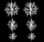 Multiple snowflake string pieces arranged for holiday decoration showcase