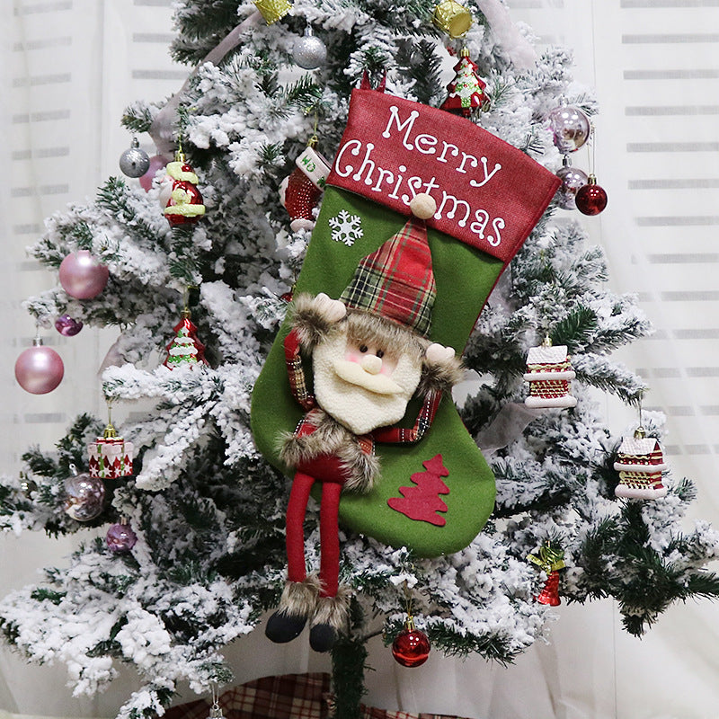 Cheerful Snowman Christmas stocking in blue and white with 3D details adding warmth to holiday fireplace decorating