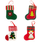 Stacked view of four fabric stocking charms ready for gifting