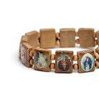 Close-up view of wooden rosary bracelet beads showing geometric shape and craftsmanship