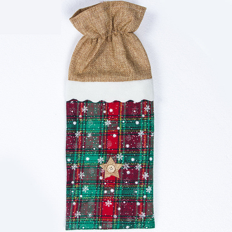 Cloth wine bottle bag with holiday motifs for Christmas dinner table decor