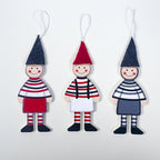 Christmas tree ornaments featuring printed wooden boy and girl figures