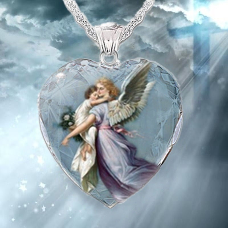 Close-up view of crystal Jesus heart pendant displaying light-catching clarity