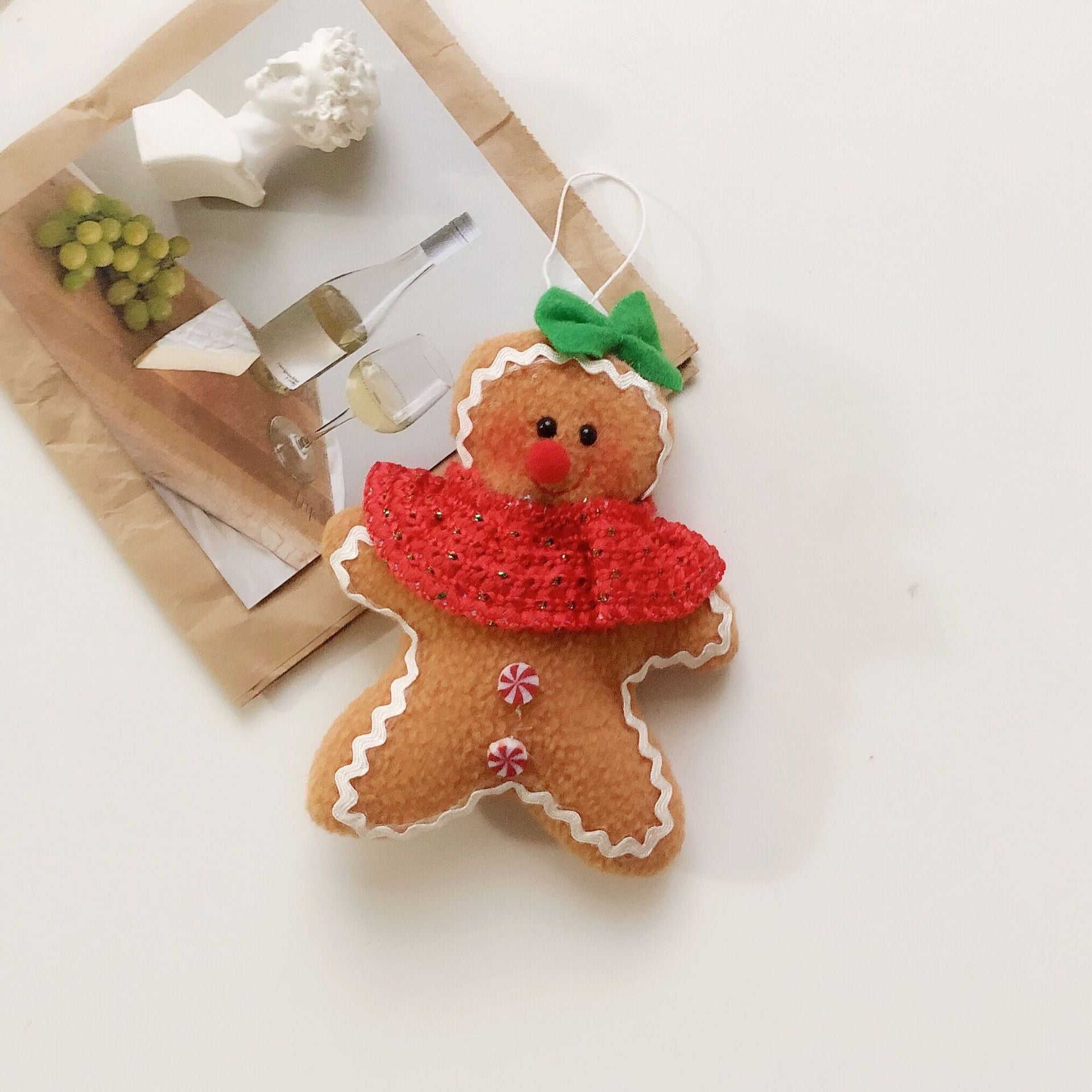 Christmas Biscuit Man plush ornament pendant with festive bow decoration