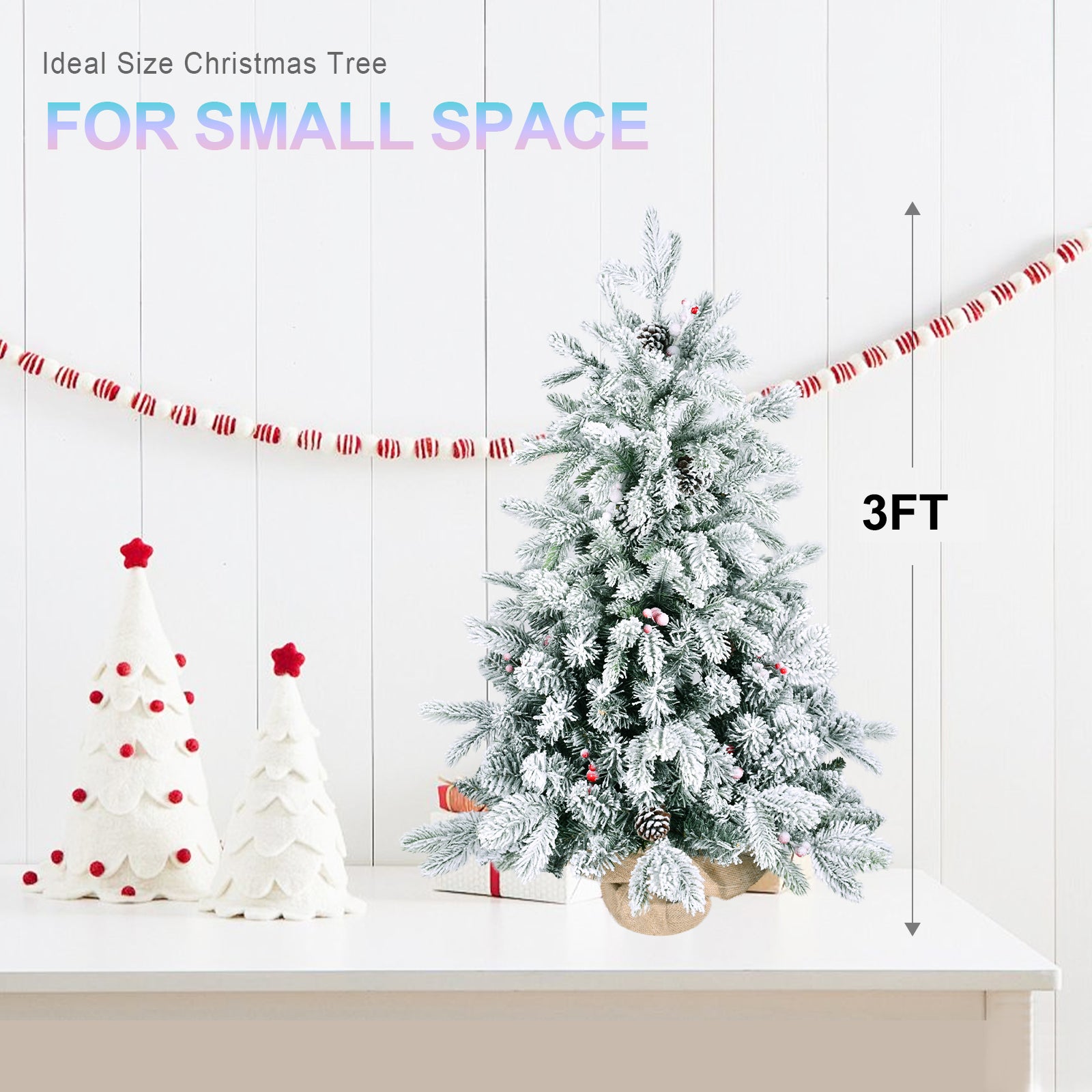Snow-flocked tabletop Christmas tree with pine cones and red berries for Christian home decor Main image