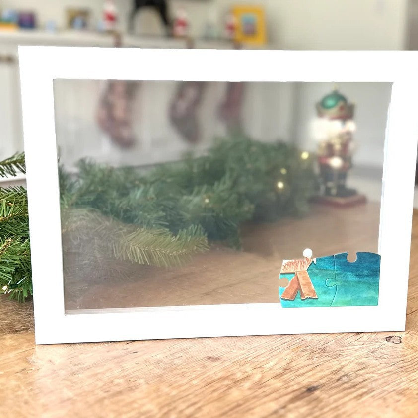 Finding God Christmas Countdown Ornament displayed on a Christmas tree with warm lighting, faith keyword