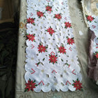 Bleached and light beige embroidered tablecloth for Christmas dining
