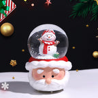 Christmas crystal ball ornament in holiday setting
