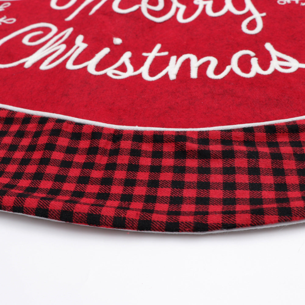 Christmas tree skirt with classic plaid edging in black and red tones for holiday ambiance