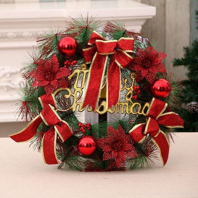 Festive Christmas ornament garland featuring gold ornament clusters