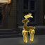 Illuminated reindeer Christmas decoration with warm white LED lights in garden setting