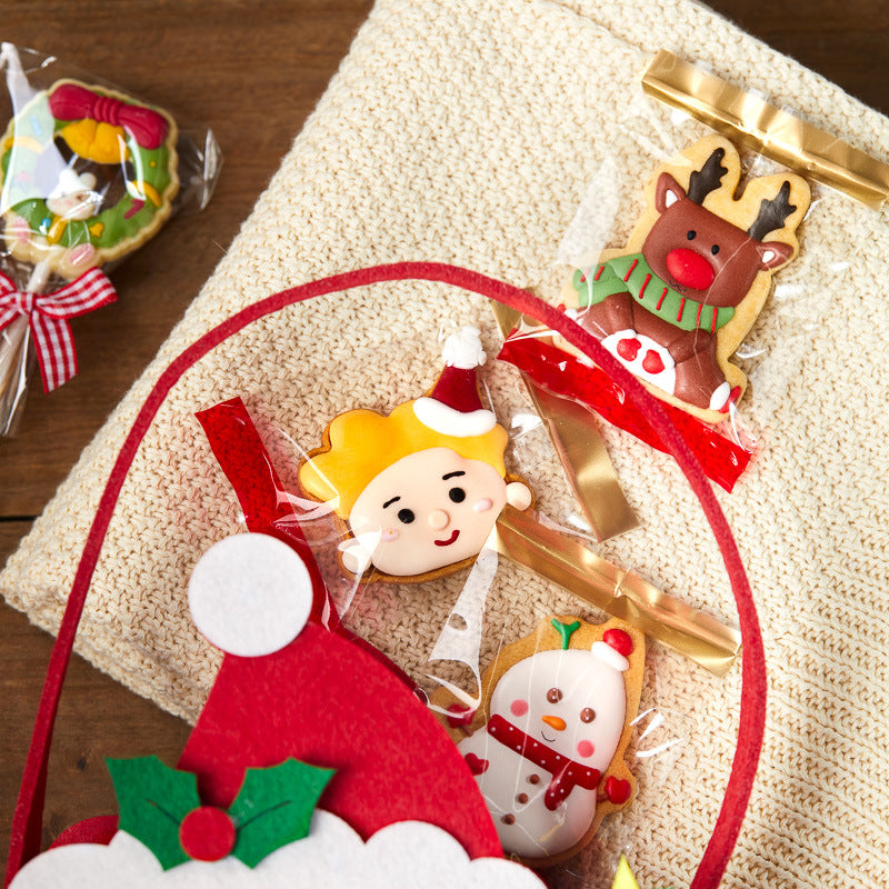 Stack of red Christmas cookie gift bags, festive holiday packaging for homemade treats