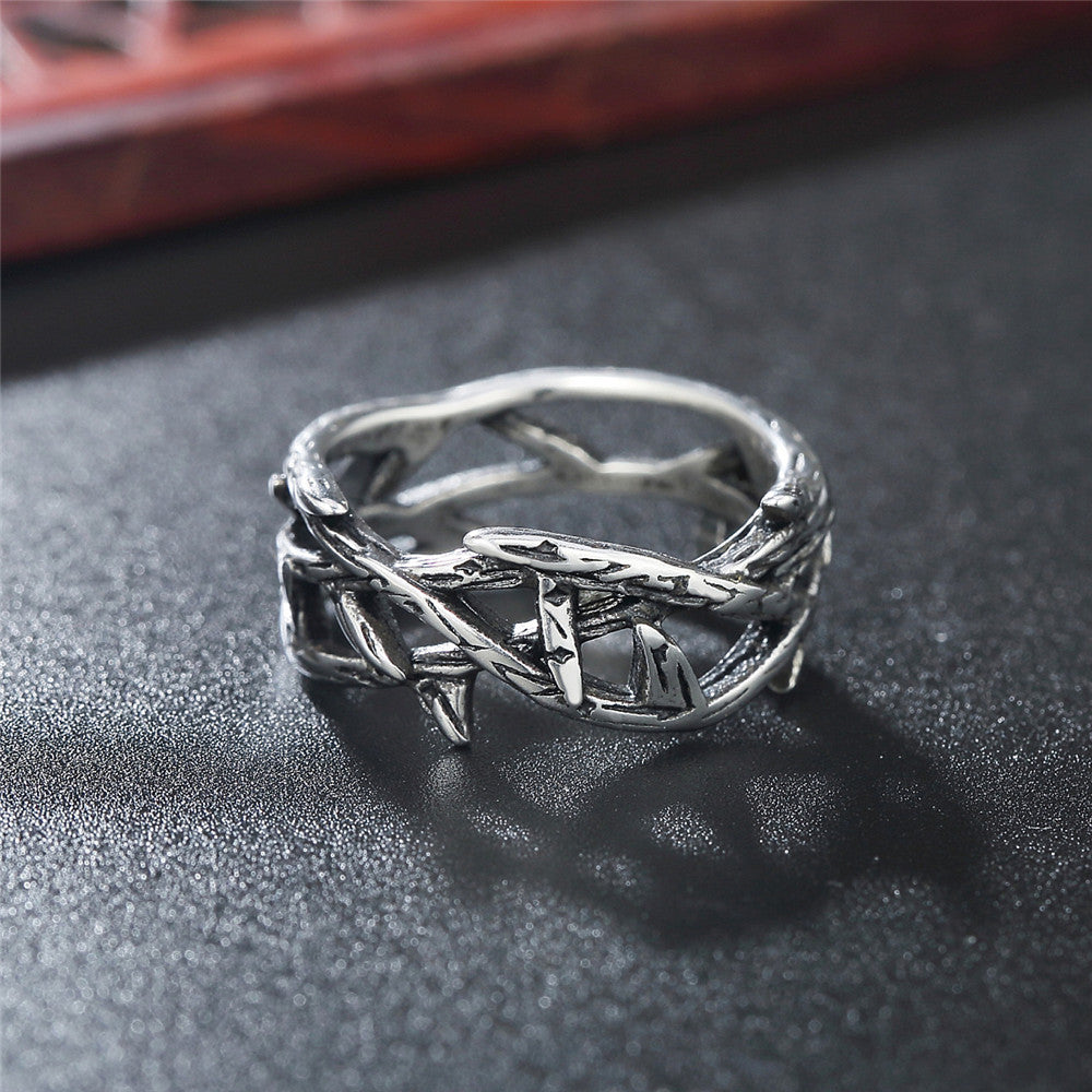 Close-up of thorn crown design on men's titanium steel ring